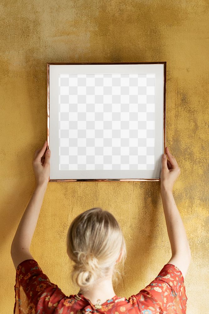 Picture frame png mockup, woman decorating wall, transparent design