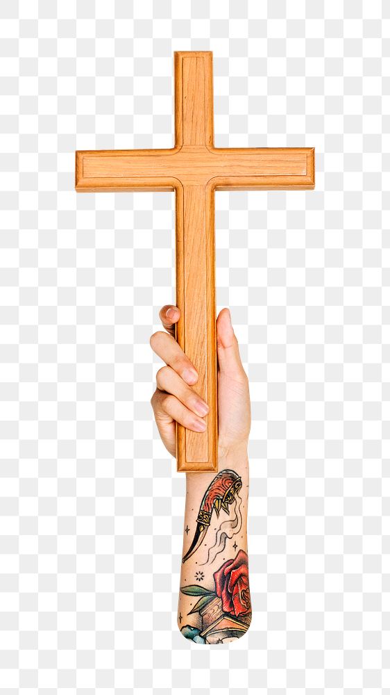 Wooden cross png in tattooed hand, transparent background
