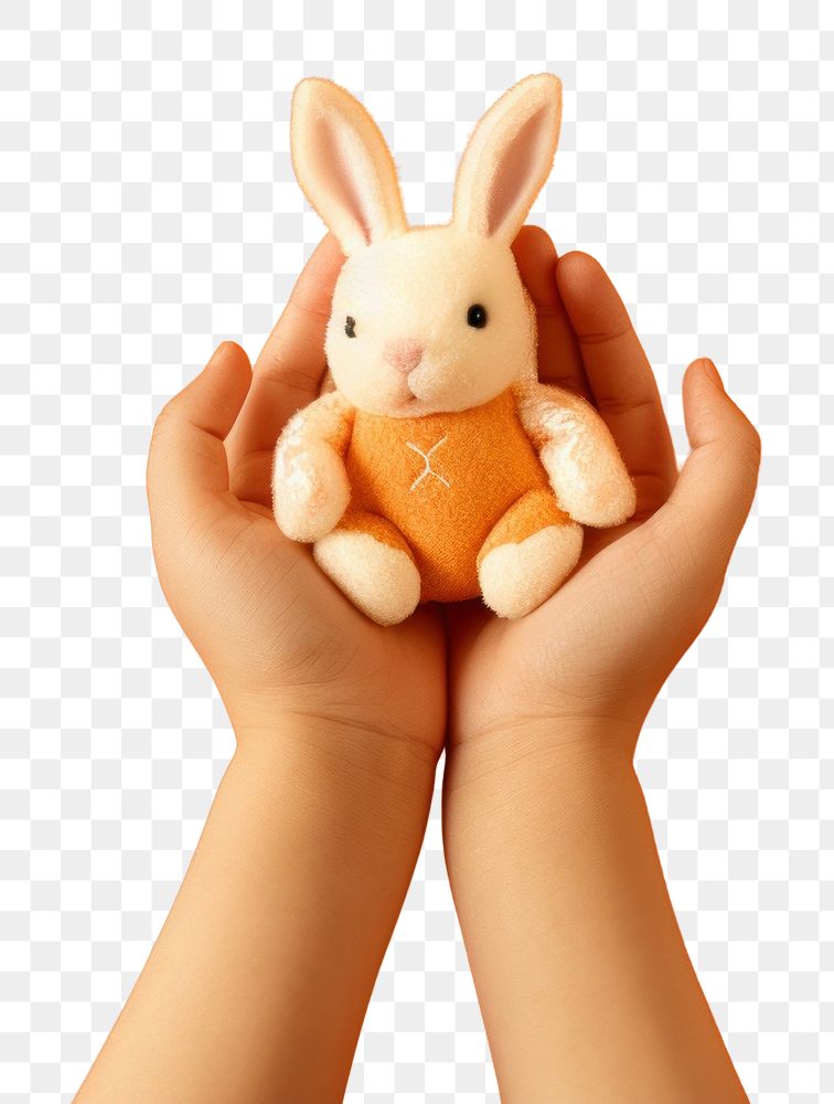 PNG Baby hands holding fabic rabbit doll mammal orange background representation. AI generated Image by rawpixel.