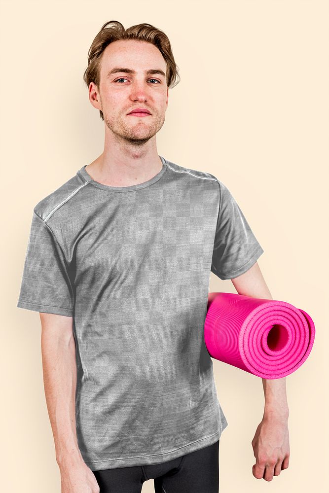 Man in sport shirt with pink yoga mat png mockup studio shot