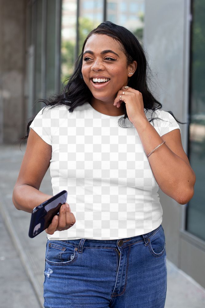 Png crop tee mockup worn by a woman walking in the city street style apparel