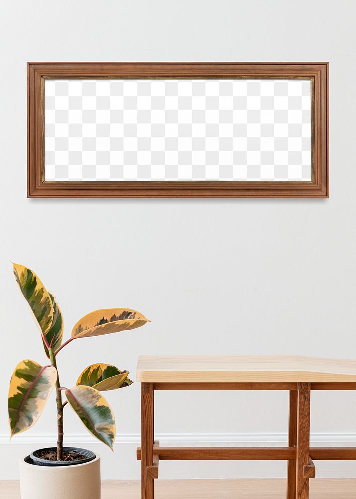 Wooden picture frame mockup hanging above a wooden bench