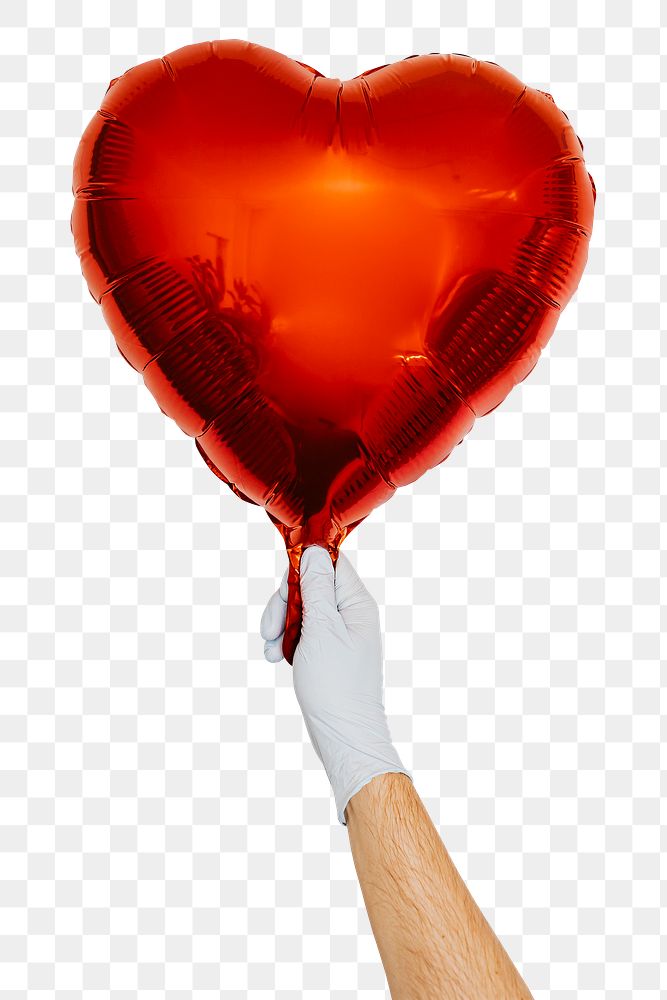 Gloved hand holding a red heart shaped balloon