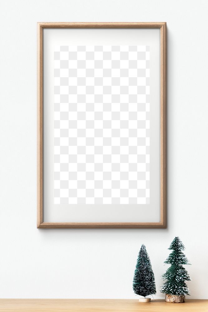 Wooden picture frame mockup by a miini Christmas tree 