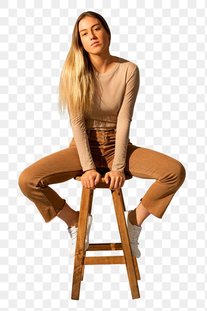 Woman png mockup in brown casual outfit sitting on a chair