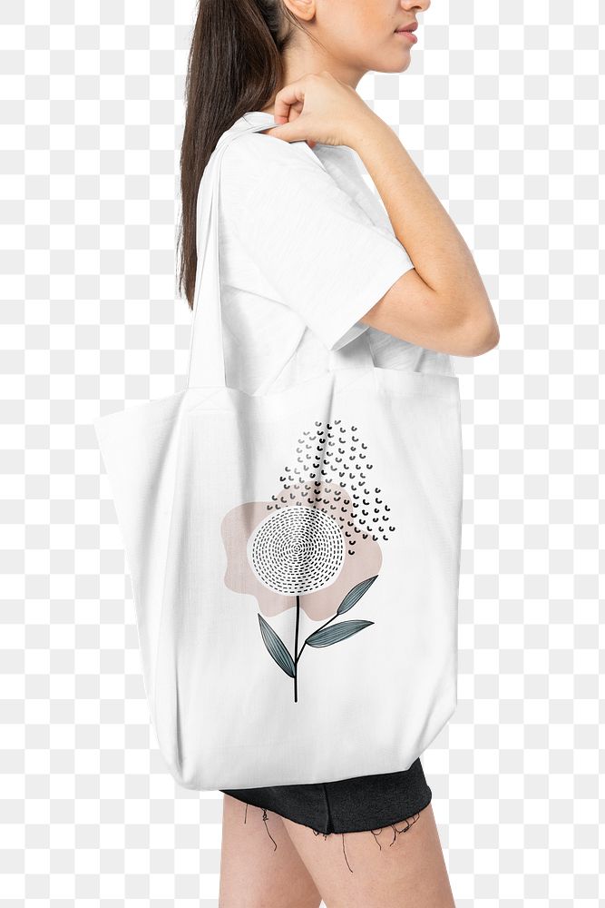 Png woman mockup carrying white tote bag with floral design