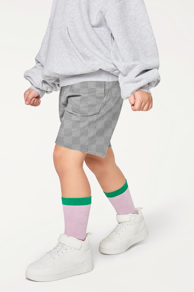Png kid gray sweatshirt with pants mockup white sneakers studio shot