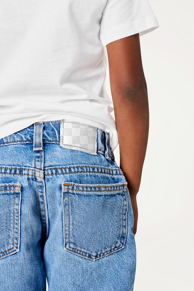 Boy wearing blue jeans with png label mockup
