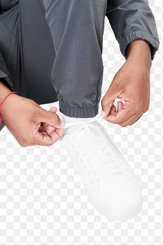 Men's footwear png white sneakers mockup model tying shoelaces