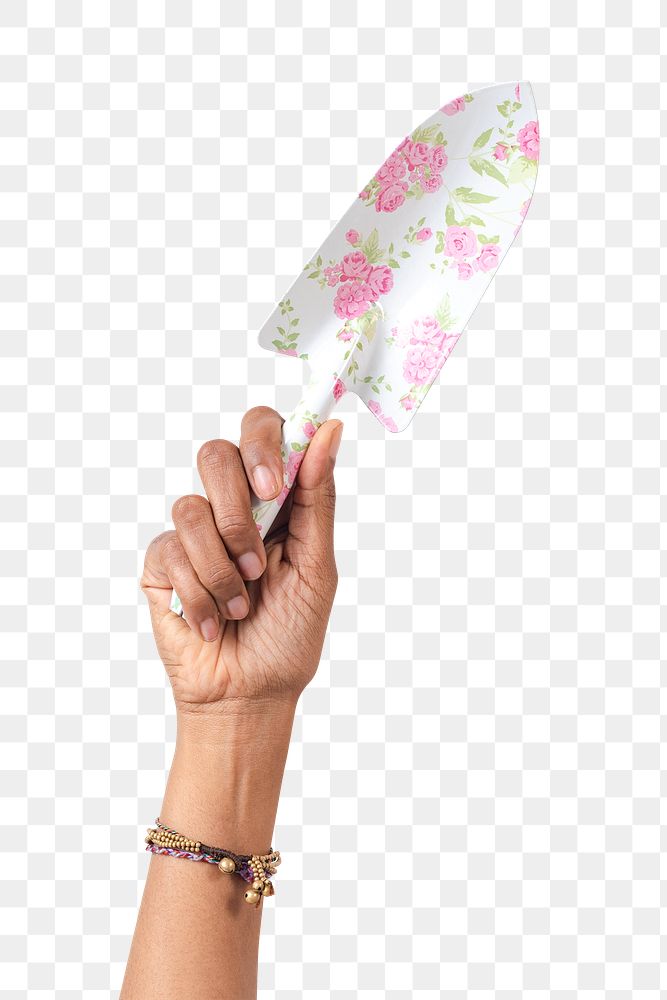 Png hand mockup holding floral patterned shovel gardening tool