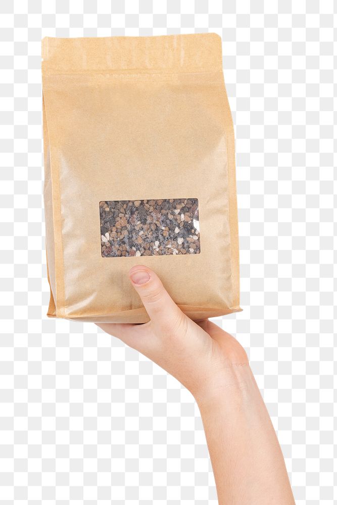 Png hand mockup holding plant fertilizer in an eco-friendly packaging bag