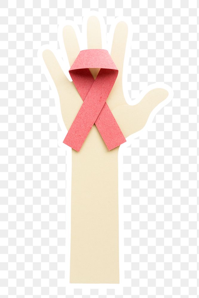 Hand holding a pink ribbon paper craft sticker