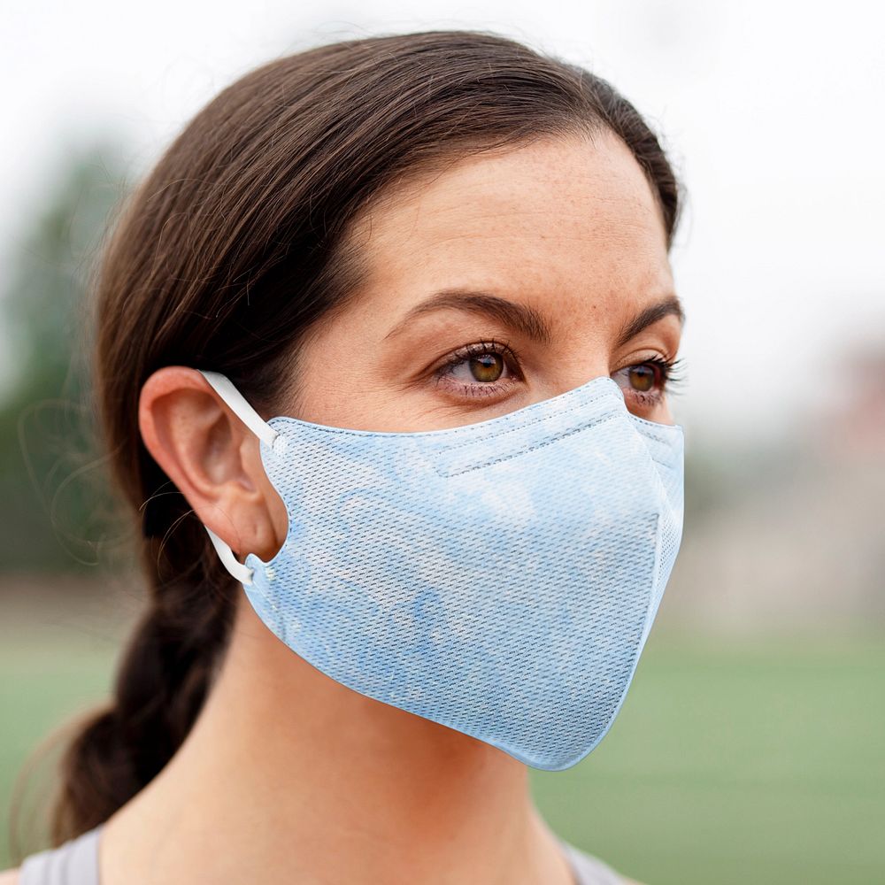 Woman wearing a face mask outdoors