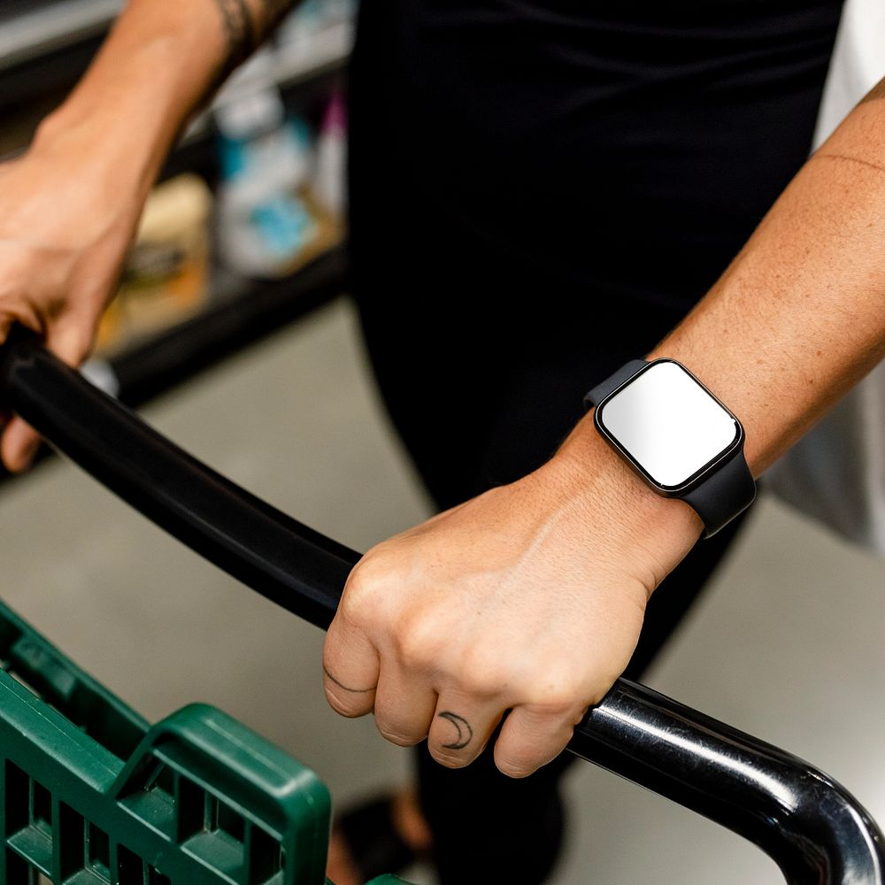 Man wearing smartwatch mockup, editable screen 