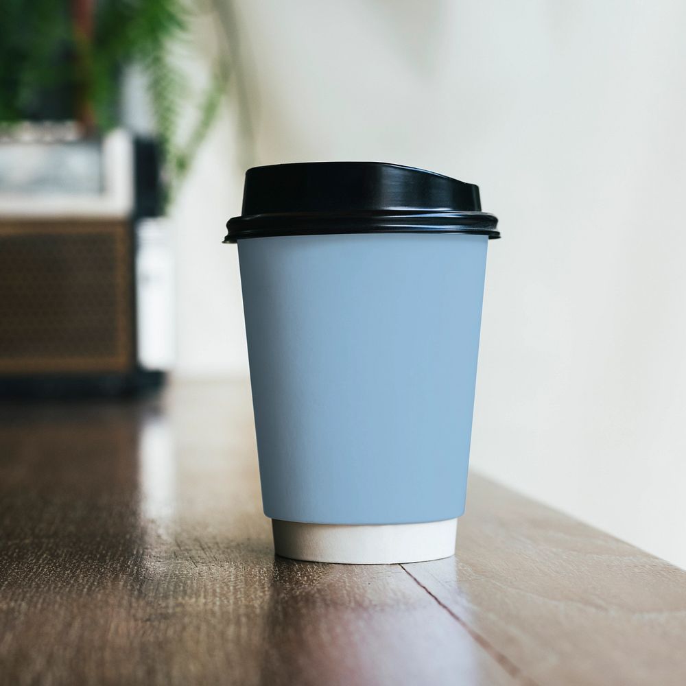 Disposable coffee cup mockup, pastel blue design