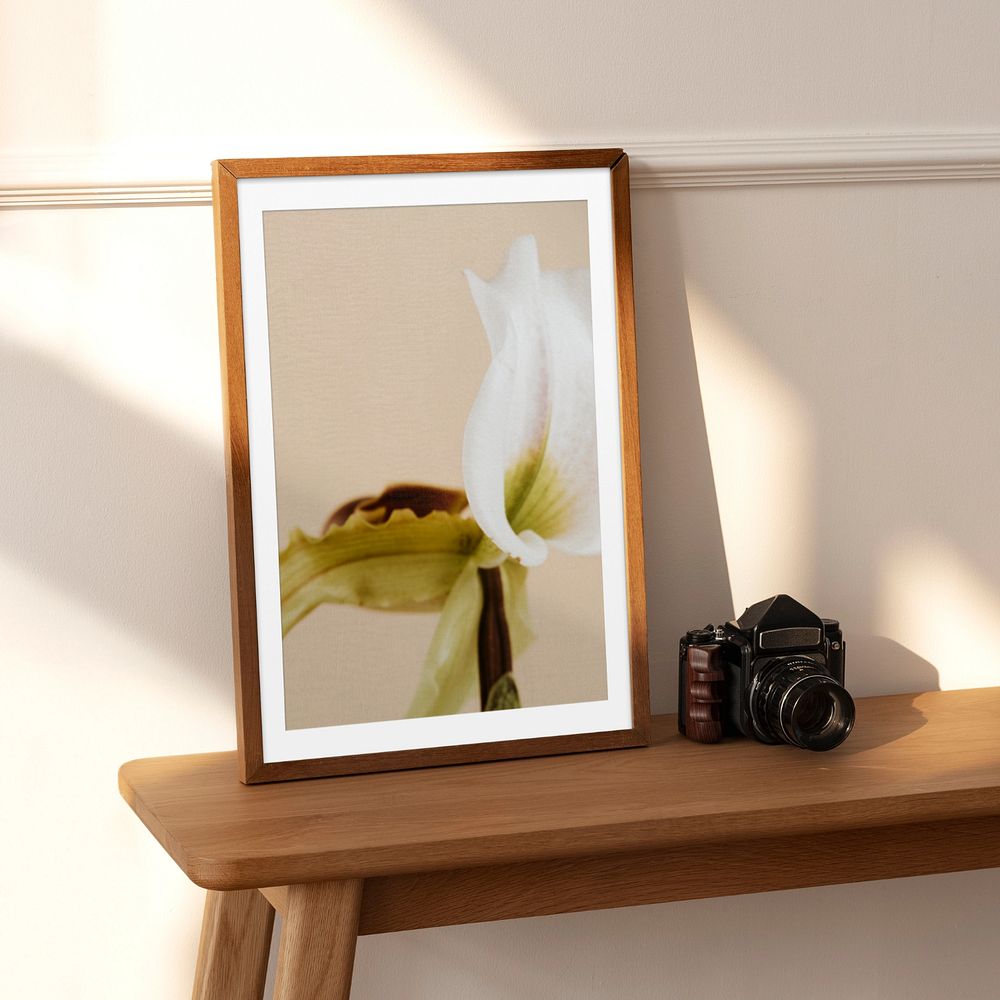 Picture frame mockup, wooden table, editable design