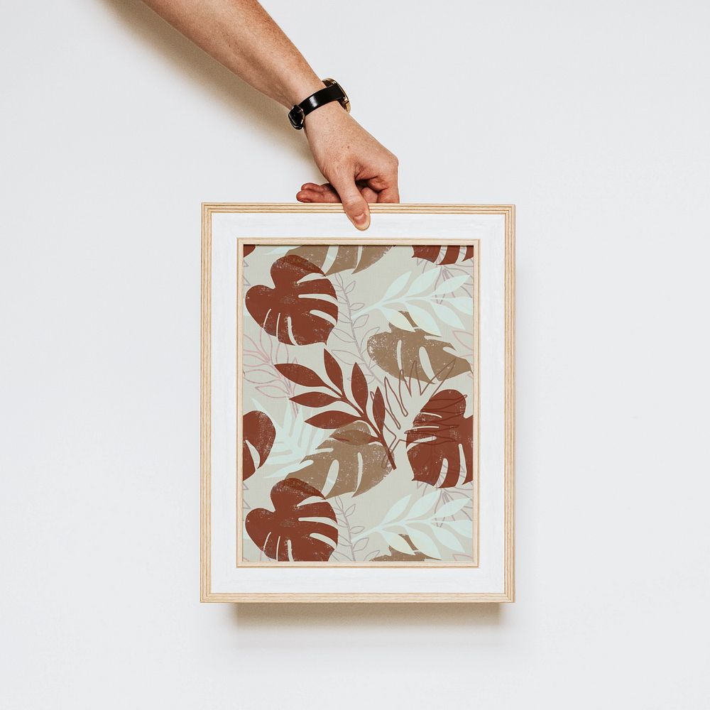 Hand holding picture frame mockup, editable design