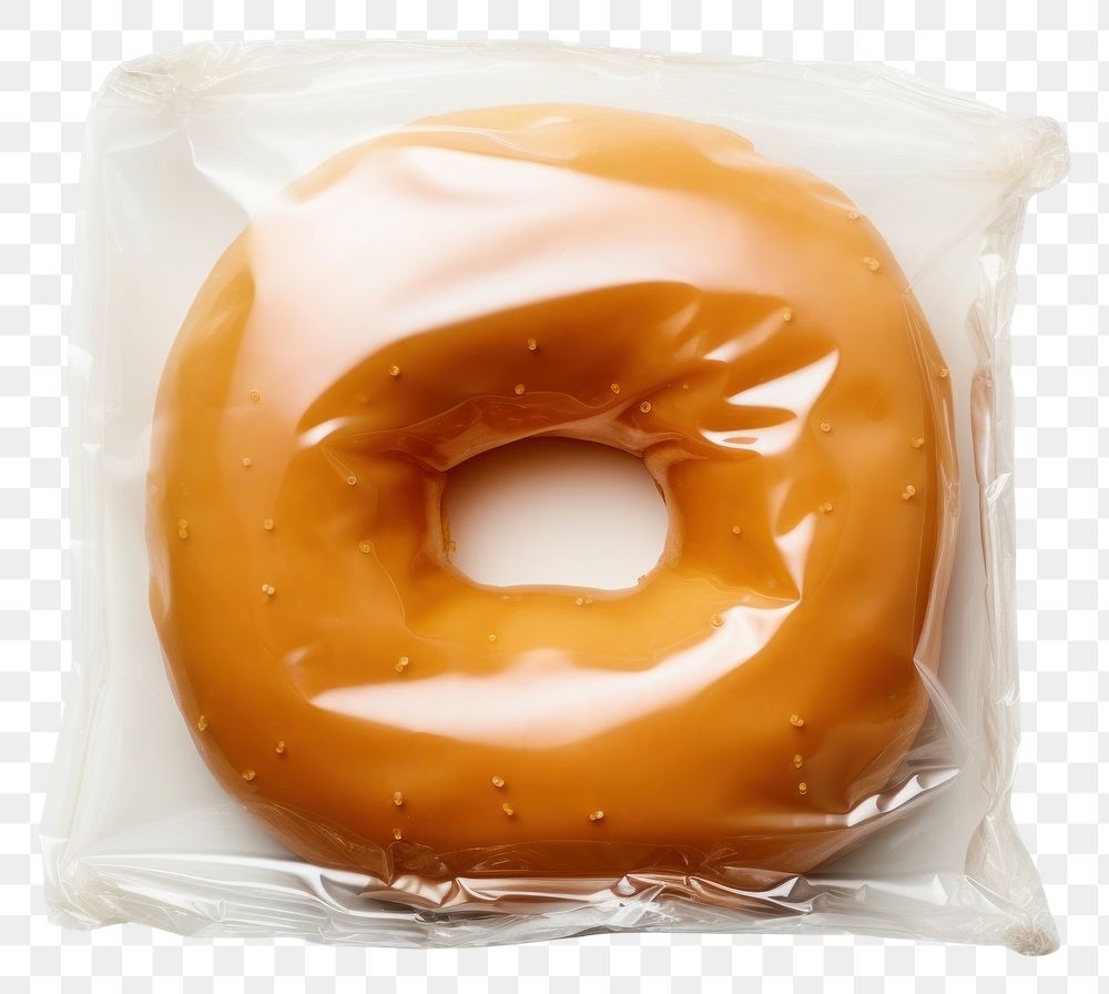 PNG  Plastic wrapping over a donut dessert bagel food.