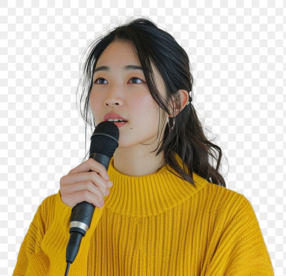 PNG  An asian woman wearing yellow sweater holding up microphone speaking in a conference adult women performance.