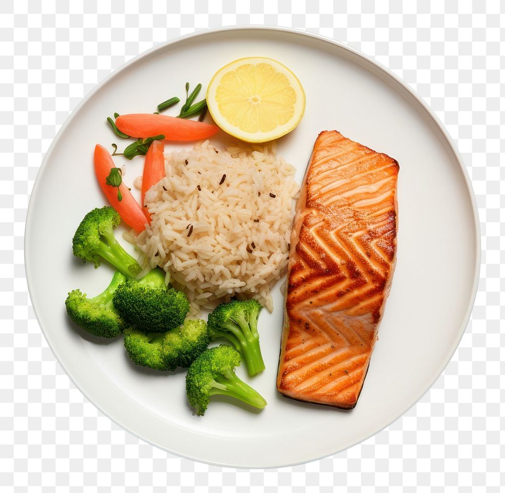 PNG  A salmon steak with rice and boiled vegetables as a side an a slice of lemon on the white plate food seafood white…
