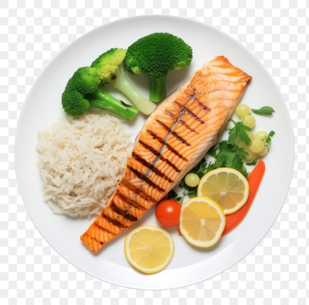 PNG  A salmon steak with rice and boiled vegetables as a side an a slice of lemon on the white plate food seafood lunch.