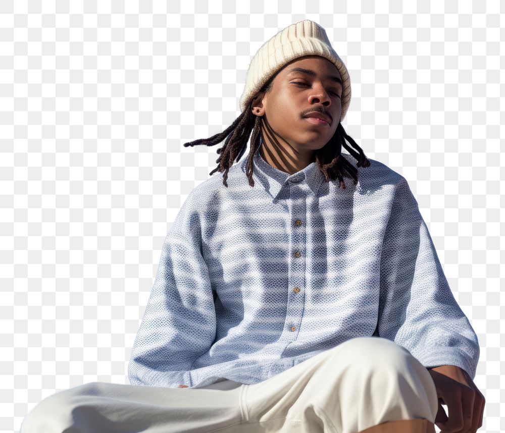 PNG A black young man wearing white short matching flannel beanie sitting adult blue.