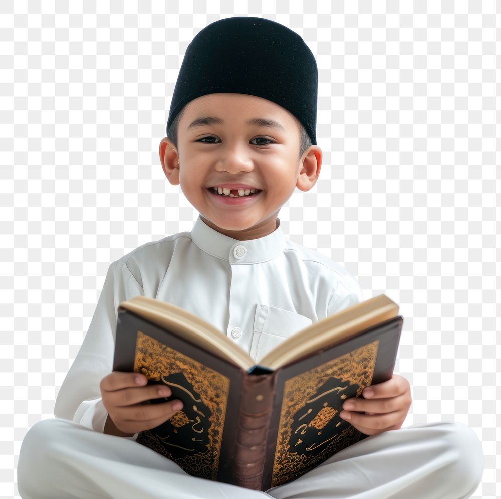 PNG  Asian Muslim boy sitting and reading Quran smiling child white background