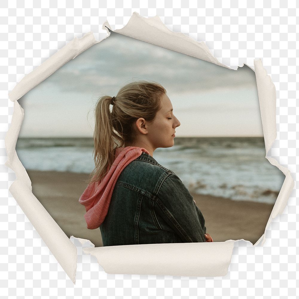 Lonely woman png badge sticker, beach in center ripped paper photo, transparent background