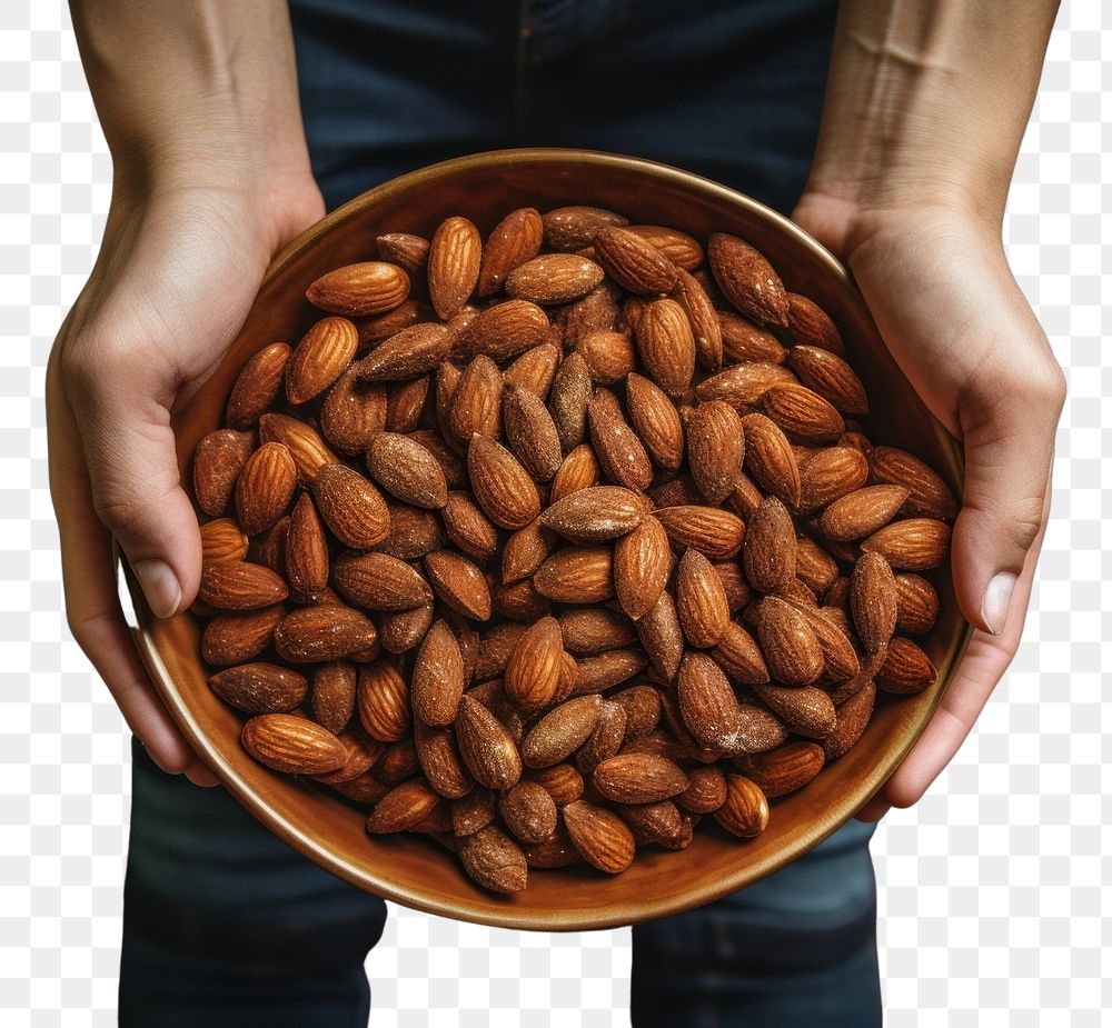 PNG  A plate of roast almonds food freshness abundance. AI generated Image by rawpixel.