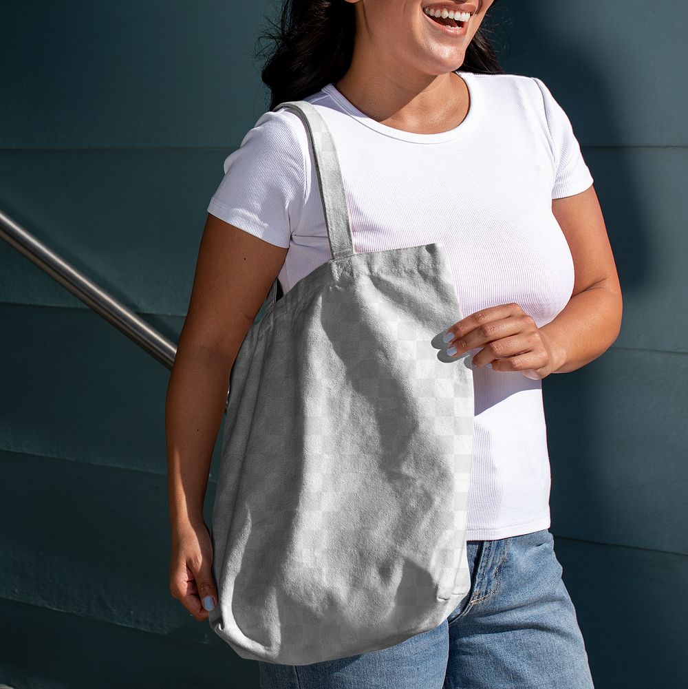Transparent bag mockup png, customizable tote accessory, Latina woman standing by the staircase