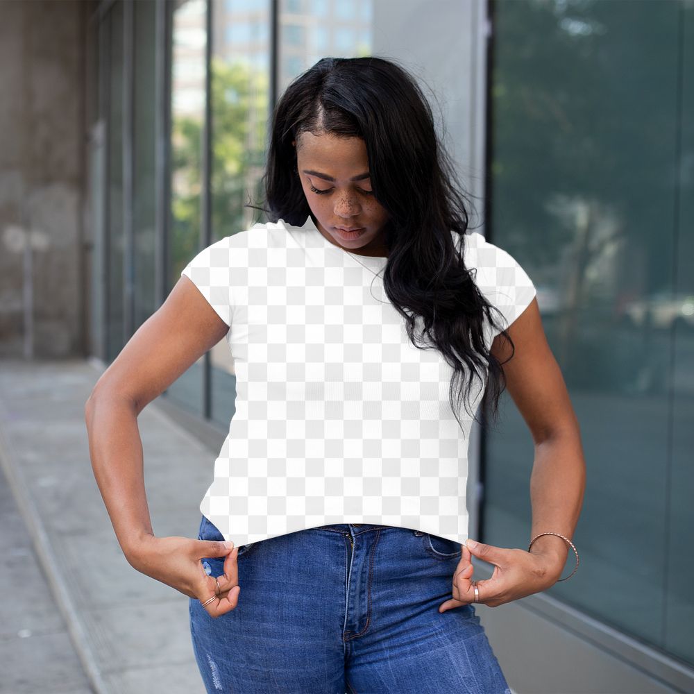 Png crop tee mockup worn by a woman walking in the city street style apparel