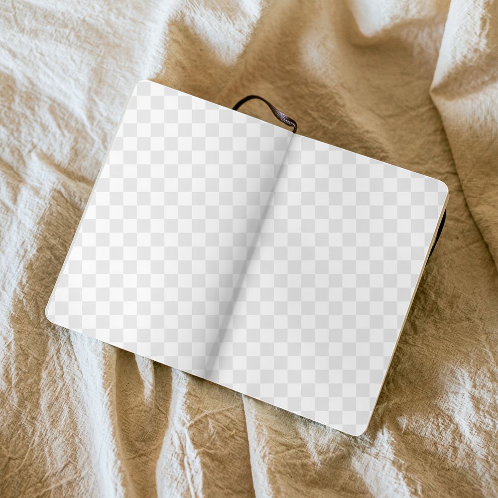 Open notebook png mockup on linen blanket