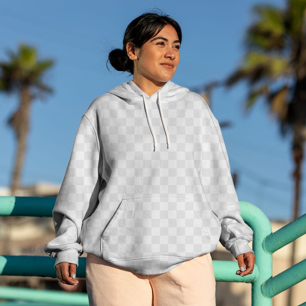 Streetwear apparel mockup png, young woman wearing hoodie at the Venice beach