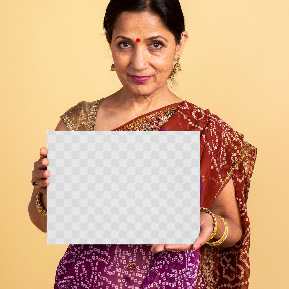 Indian woman in a traditional saree holding a paper mockup 