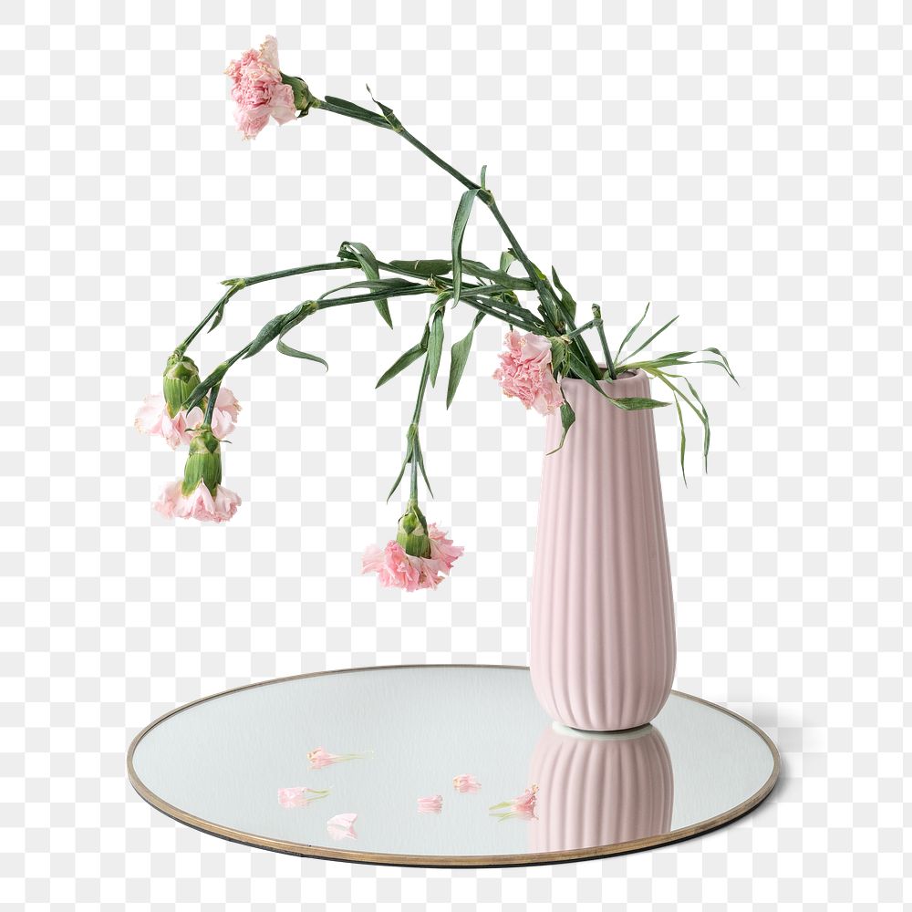 Withered pink carnation in a pink vase on a shiny tray design element