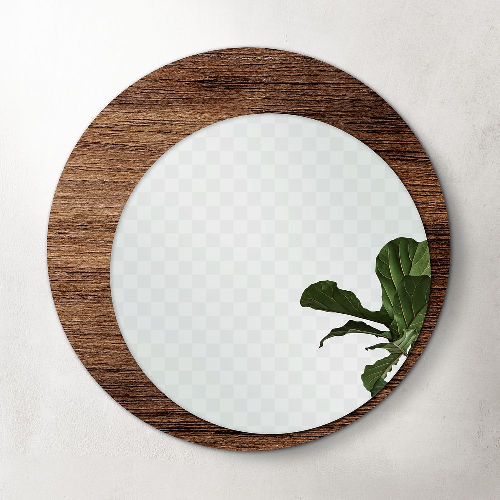 Circular mirror with a wooden frame mirroring fiddle-leaf fig leaves transparent png