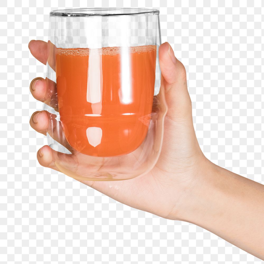Cold-pressed carrot juice in a double wall glass