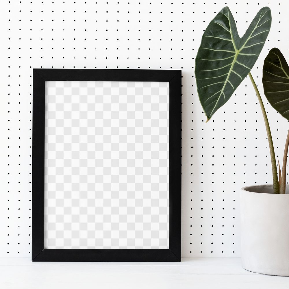 Png picture frame mockup next to houseplants home decor