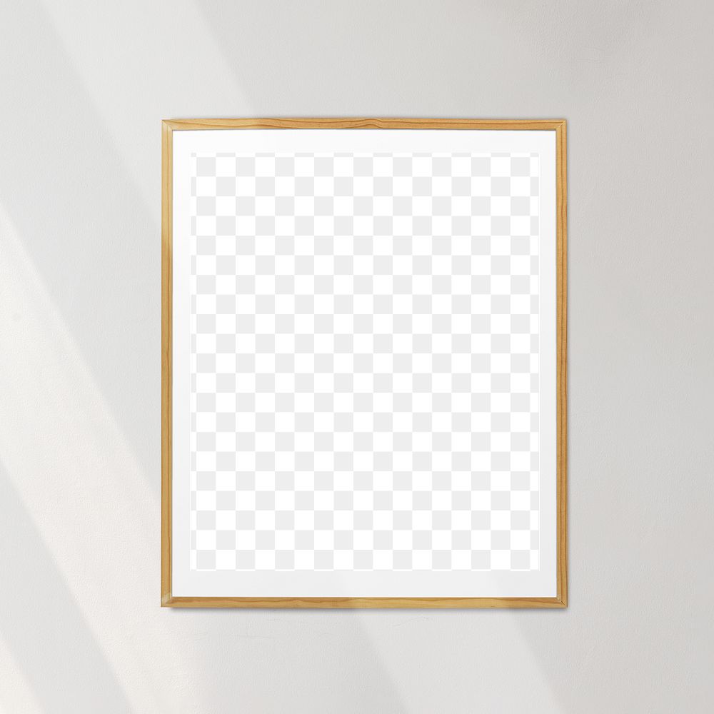 Wooden picture frame mockup hanging on a wall 