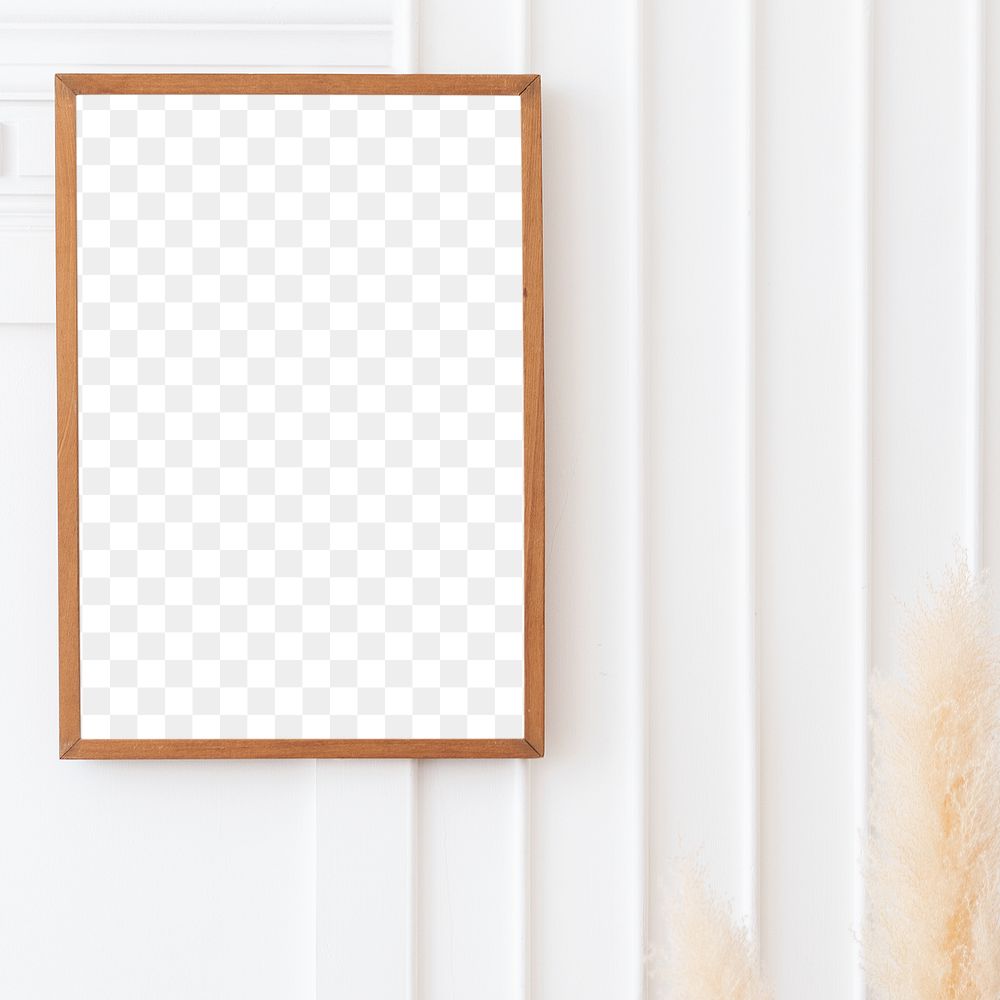 Picture frame mockup and dried pampas grass in a vase hanging on a wall 