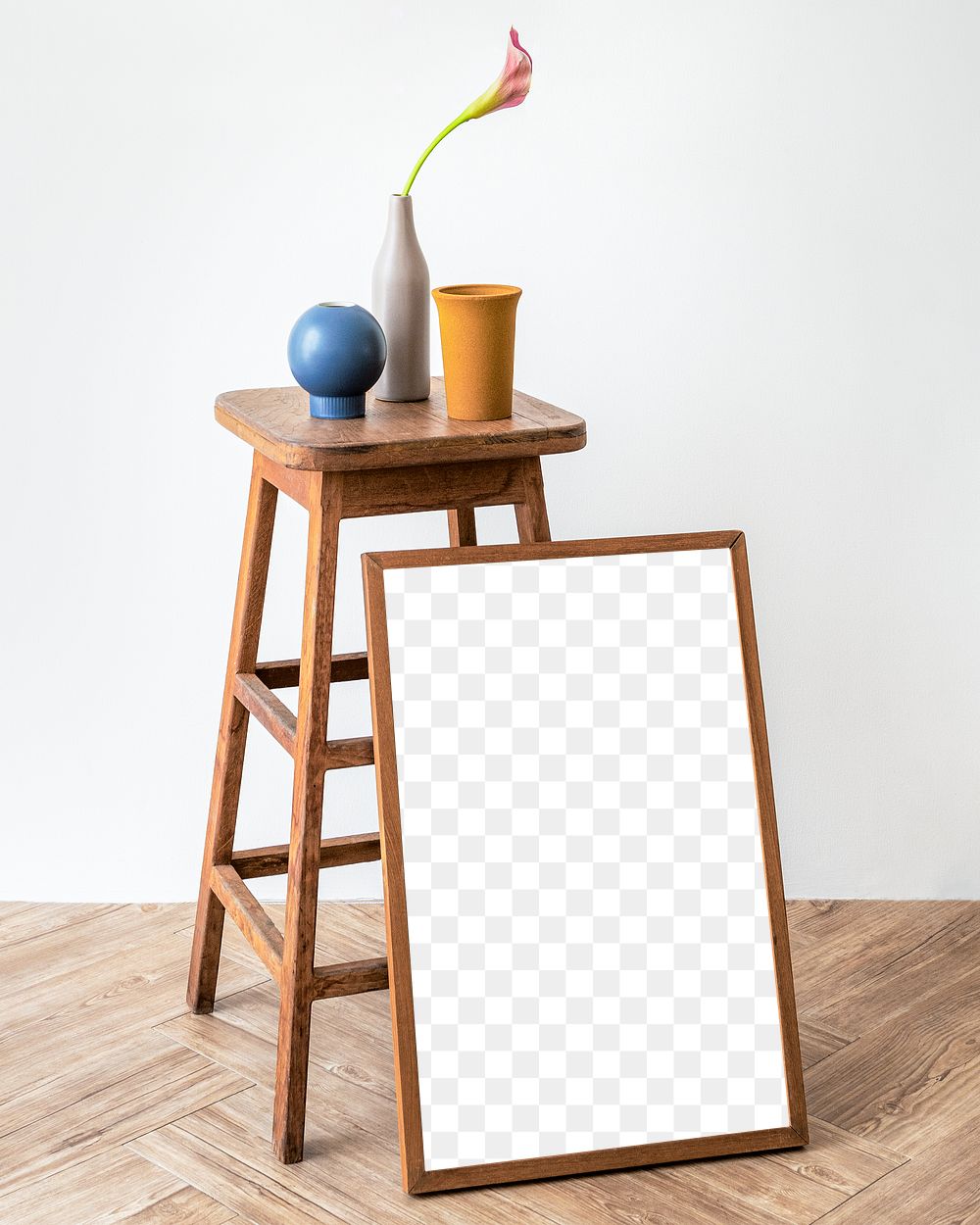 Picture frame mockup by a wooden stool