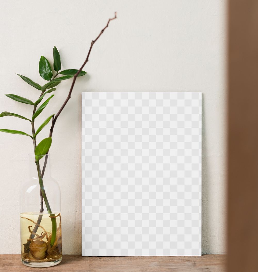 Frame mockup png next to a plant in a glass vase