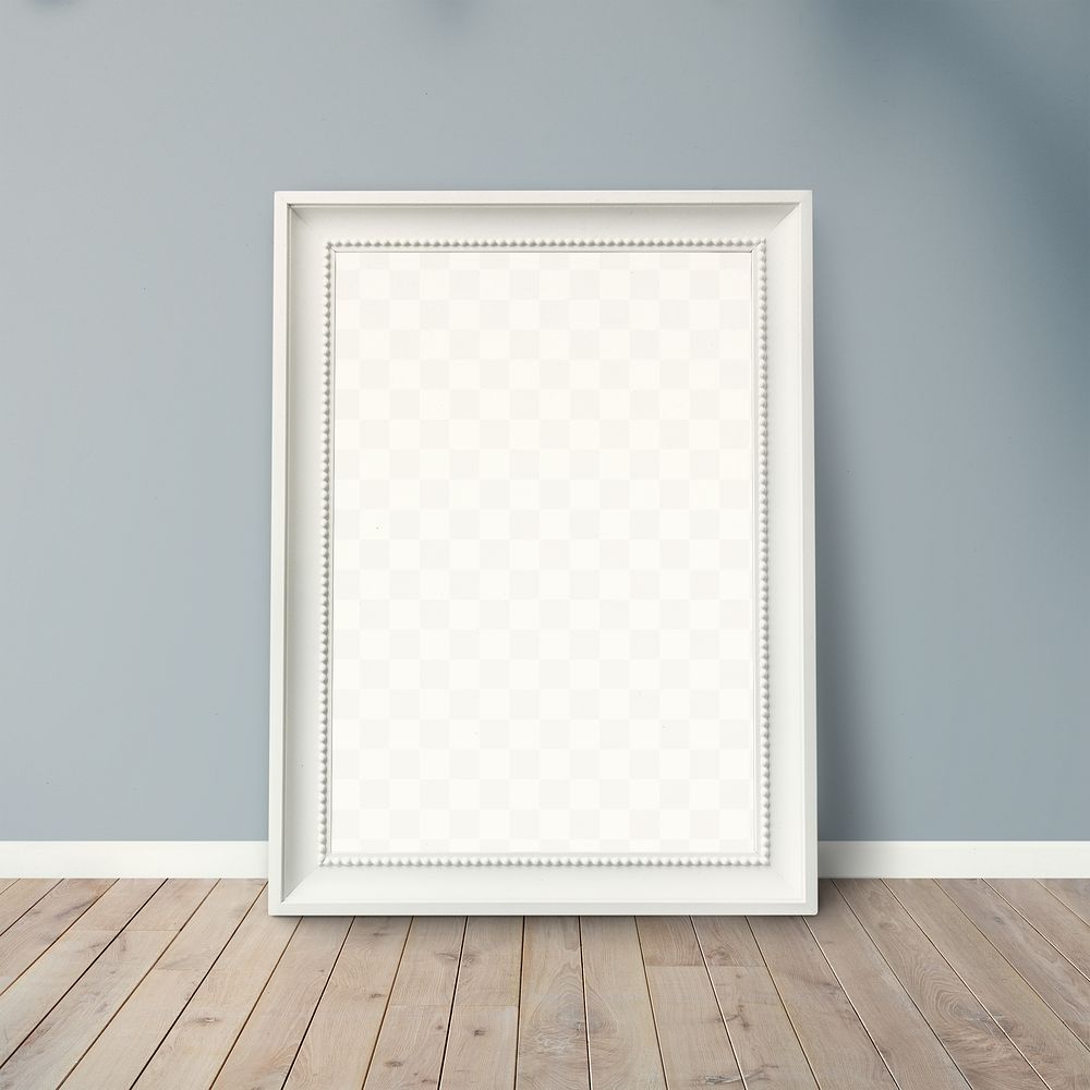White picture frame mockup leaning against a gray wall