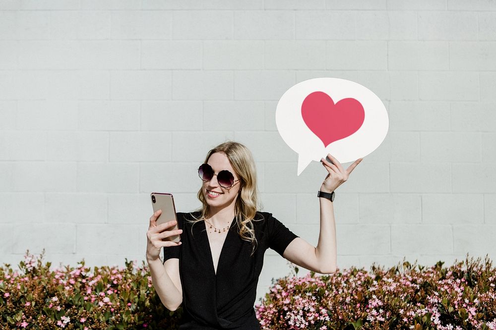 Woman holding speech bubble sign  editable mockup