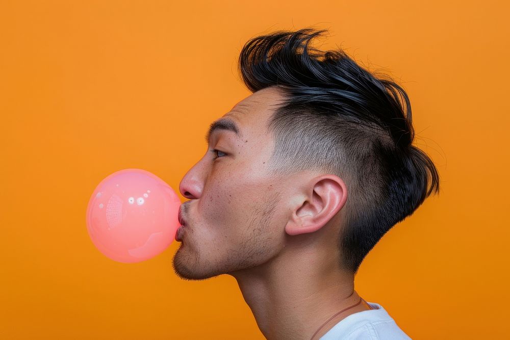Man blowing bubble gum balloon person adult.