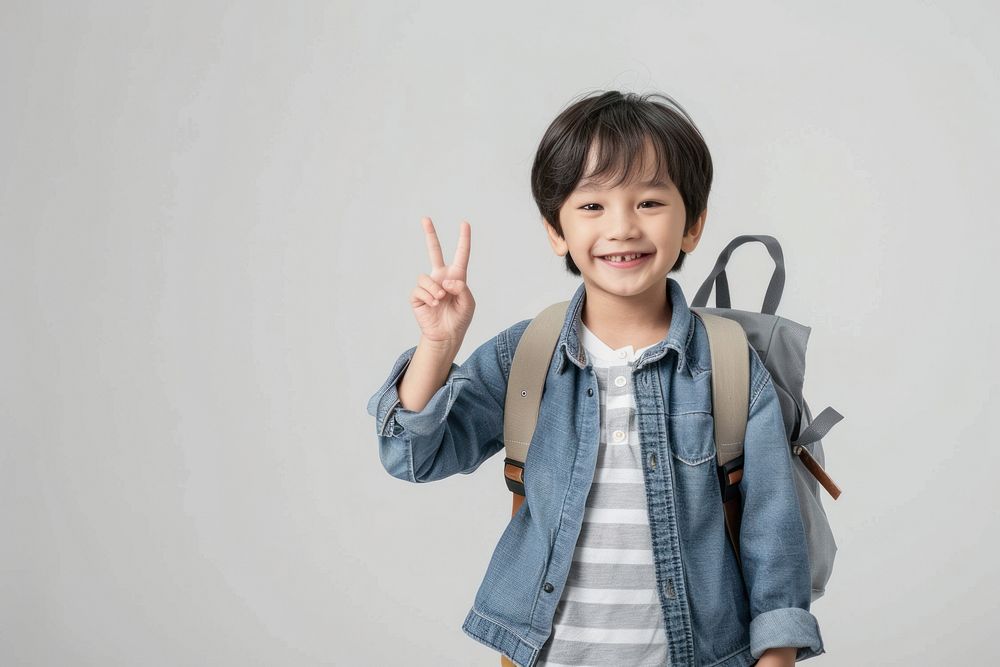 Child Raising two fingers bag backpack clothing.