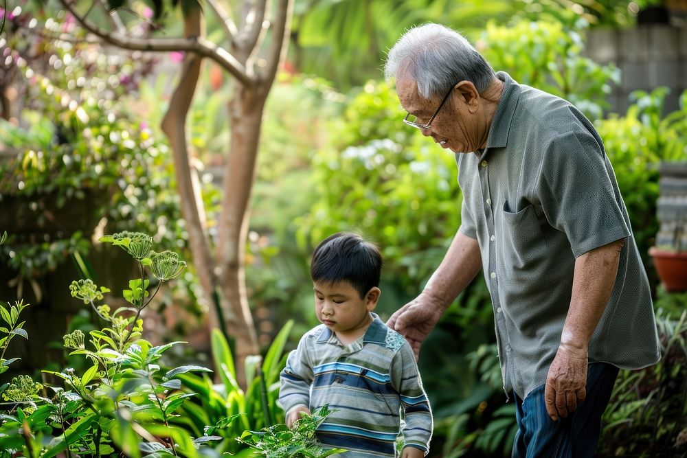 East asian grandpa garden gardening outdoors.