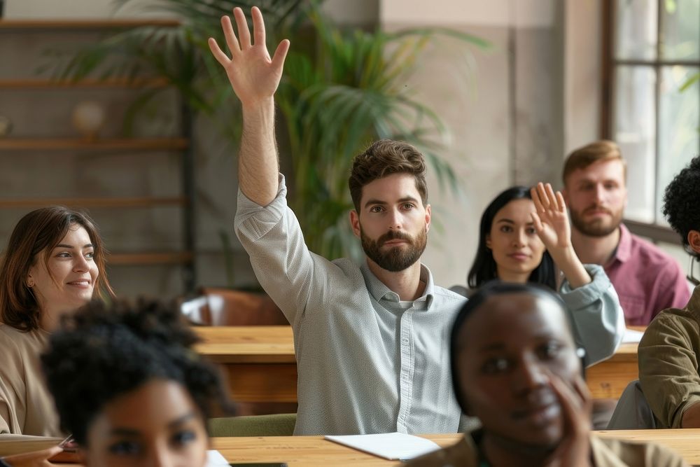 Ambitious male employee raise hand ask question female man student.