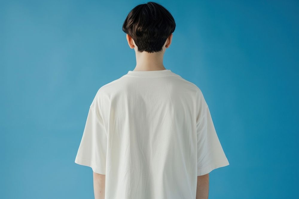 Blank cream oversize t-shirt mockup apparel clothing shoulder.