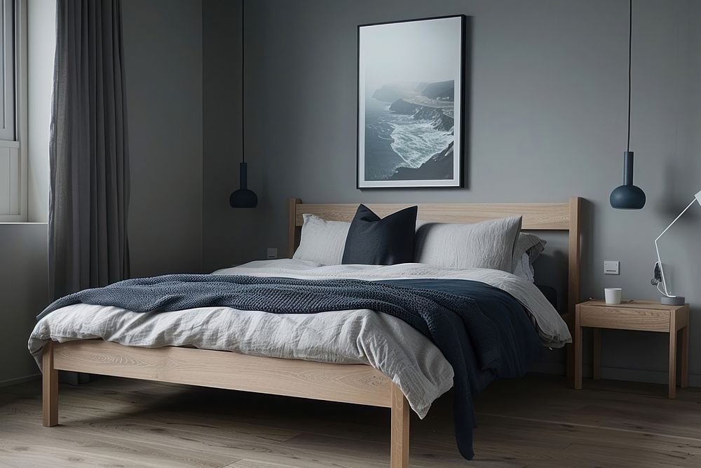 A minimalistic bedroom with an oak wood bed frame pillow lamp furniture.